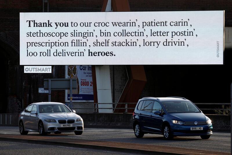 An electronic ad thanking the heroes of the moment is seen on the streets of Manchester, as the spread of the coronavirus disease (COVID-19) continues, Manchester, Britain. REUTERS