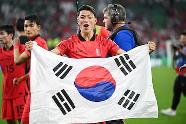 AL RAYYAN, QATAR - DECEMBER 02: Heechan Hwang of Korea Republic celebrates after the team's qualification to the knockout stages during the FIFA World Cup Qatar 2022 Group H match between Korea Republic and Portugal at Education City Stadium on December 02, 2022 in Al Rayyan, Qatar. (Photo by Stuart Franklin / Getty Images)