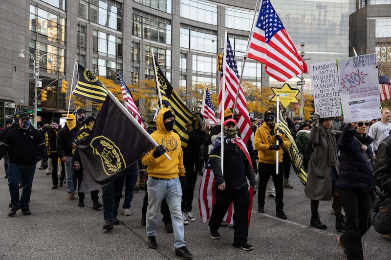 Proud Boys march with demonstrators during a protest against the Covid-19 vaccine in New York. AFP