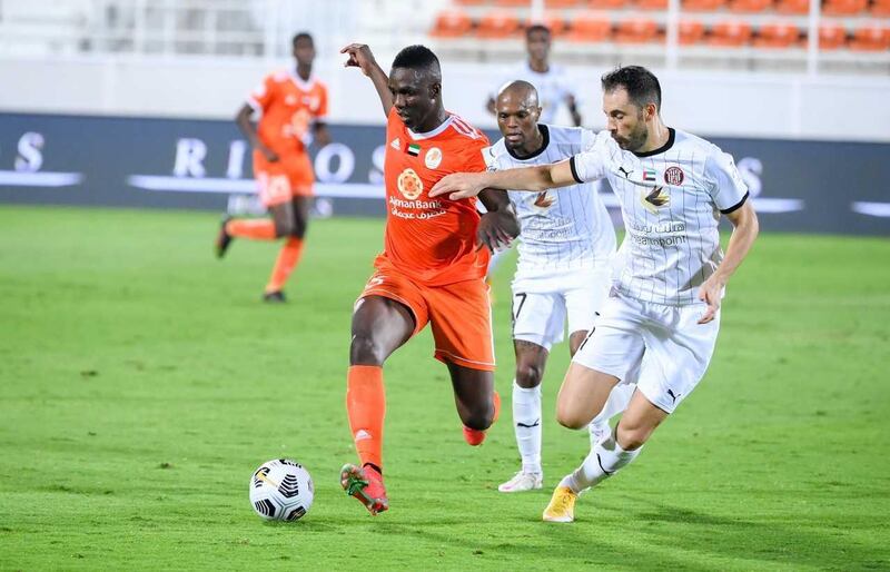Ajman’s Malian forward Madibo Maiga, left, scored twice against Al Jazira to help his side claim a 3-3 draw. Courtesy Arabian Gulf League
