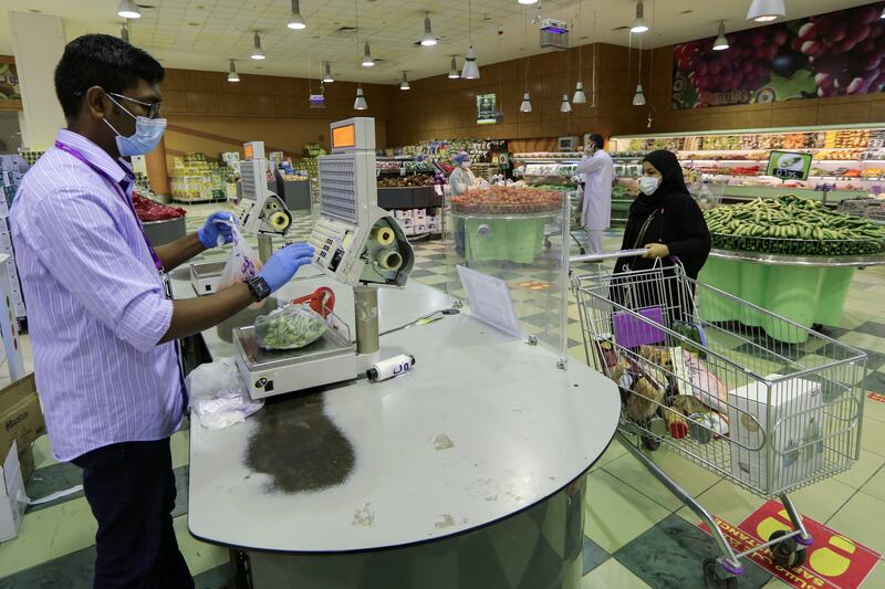 A Saudi woman wearing a face mask, shops at a supermarket following the outbreak of the coronavirus disease (COVID-19) in Riyadh, Saudi Arabia June 14, 2020. REUTERS/Ahmed Yosri