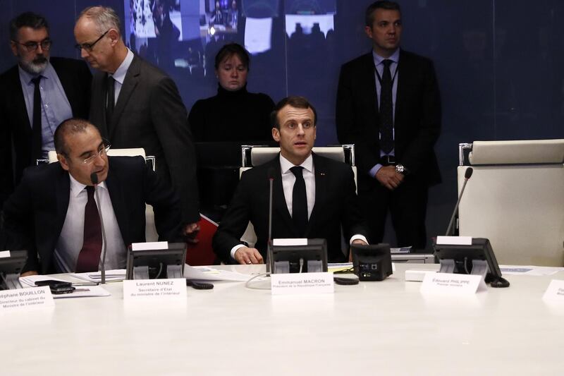 French President Emmanuel Macron presides over an emergency crisis meeting at the Interior Ministry in Paris. EPA