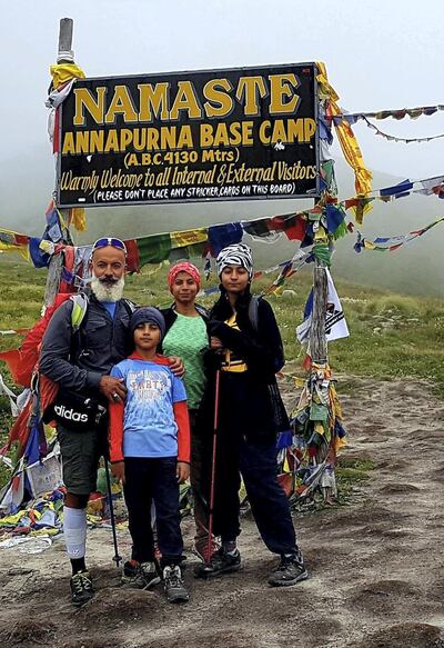 Rajesh and Mamta Daryani with their children, Advika and Adonis, trekking at the Annapurna Base Camp in Nepal.