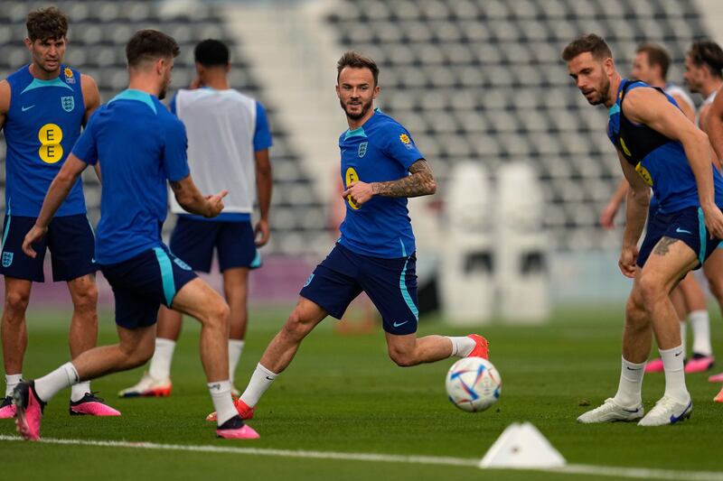 England's James Maddison, middle, takes part in drills during training session at the Al Wakrah Sports Complex. AP