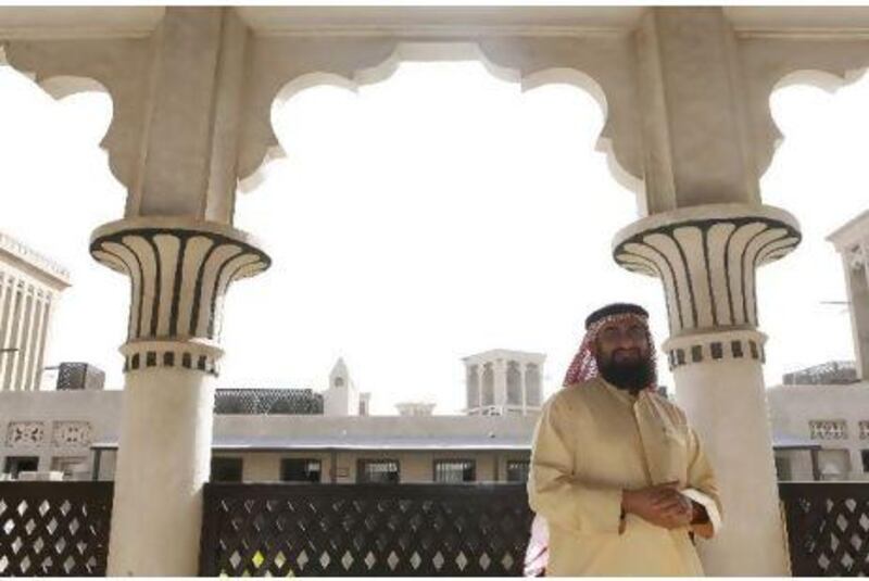 Rashad Bukhash, the chairman of the UAE Architectural Heritage Society, in Bastakiya, home to some of the best preserved examples of Emirati architecture. Jeffrey E Biteng / The National