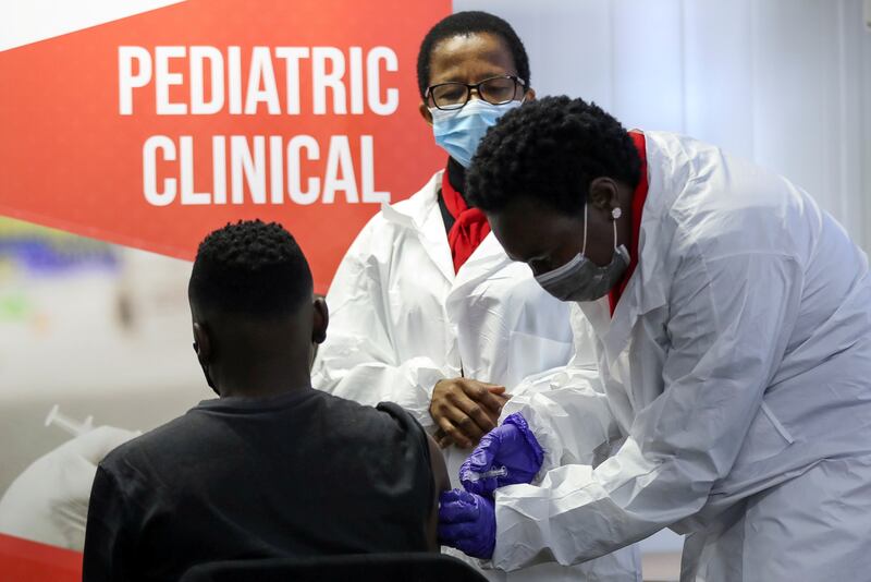A health worker administers a Covid vaccine in Pretoria, South Africa. The pandemic has substantially affected the continent’s economies despite low official case numbers, according to Kiel Institute research. Photo: Reuters