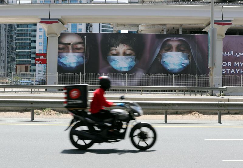 Dubai, United Arab Emirates - Reporter: N/A: Photo Project. Artist Maitha Demithan has her work show all over Dubai to encourage people to stay at home. Thursday, April 15th, 2020. Internet City on Sheikh Zayed Road, Dubai. Chris Whiteoak / The National