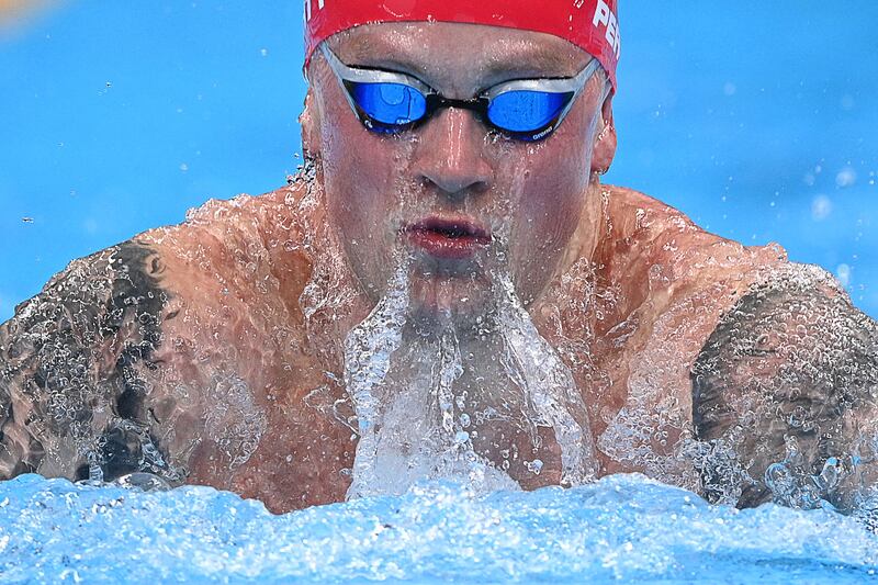 Britain's Adam Peaty competes to win the final of the men's 100m breaststroke swimming event.