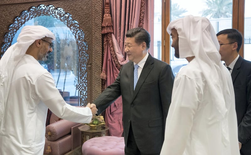 ABU DHABI, UNITED ARAB EMIRATES - July 20, 2018: HH Major General Sheikh Khaled bin Mohamed bin Zayed Al Nahyan, Deputy National Security Adviser (L) greets HE Xi Jinping, President of China (2nd L), prior to a private dinner, at Sea Palace. Seen with HH Sheikh Mohamed bin Zayed Al Nahyan, Crown Prince of Abu Dhabi and Deputy Supreme Commander of the UAE Armed Forces (R).
( Rashed Al Mansoori / Crown Prince Court - Abu Dhabi )
---