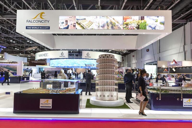 Above, the Falconcity of Wonders stand at Cityscape Global 2015 in Dubai. The development is now split into 69 different sectors with sub developers in charge of various projects across the park. Antonie Robertson / The National