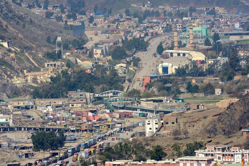 Afhan trucks line up as they wait to cross the Pakistan-Afghanistan closed amid concerns over the spread of the COVID-19 novel coronavirus, in Torkham some 54 kms fron Peshawar. AFPMAJEED