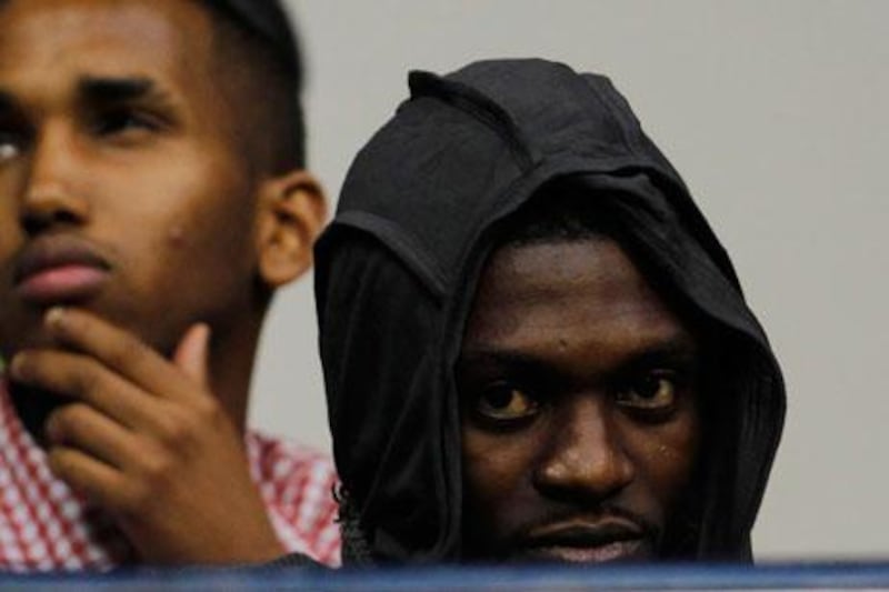 Emmanuel Adebayor in the stand during the Tottenham Hotspur's match against Hearts.