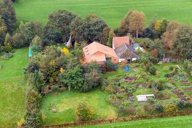 A drone photo of the farm, where a father and six children had been living in the cellar, In Ruinerwold, The Netherlands, October 15 2019. The family lived in the cellar for years. EPA/Wilbert Bijzitter