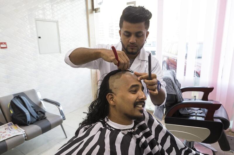 After two years of growing his hair, Indian Tarun Kurian Thomas donated his locks to the Hair for Hope initiative to be made into a wig. Antonie Robertson / The National