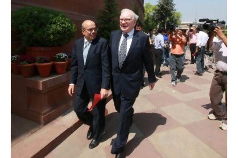 Philanthropist Warren Buffett leaves a meeting with Indian prime minister Monmohan Singh. A reader praises the visit of Mr Buffett and Bill Gates to India to encourage local tycoons to share their wealth. Pankaj Nangia/Bloomberg