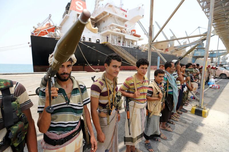 Members of the Houthi movement are seen during withdrawal from Saleef port in Hodeidah province, Yemen May 11, 2019. Picture taken May 11, 2019.  REUTERS/Abduljabbar Zeyad