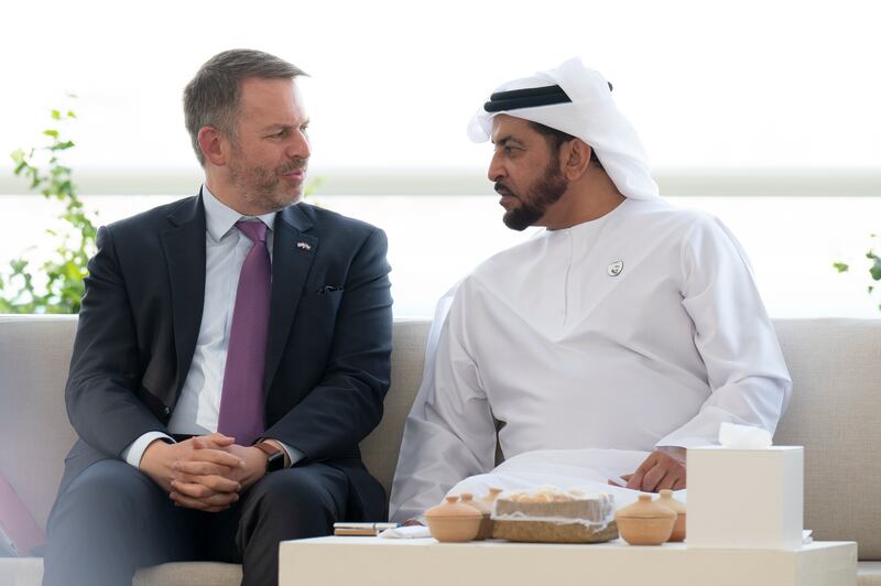 Sheikh Hamdan bin Zayed speaks with a delegate accompanying Grand Duke Henri.