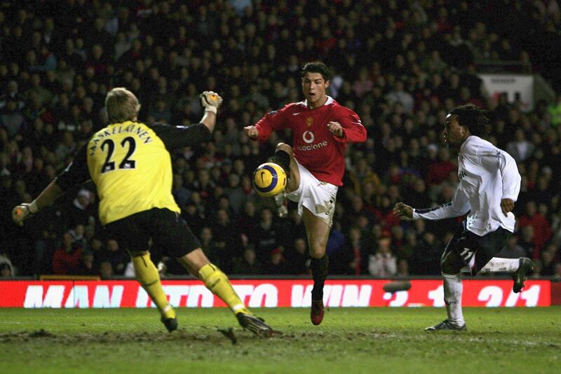 MANCHESTER, UNITED KINGDOM - DECEMBER 31:  Cristiano Ronaldo of Manchester United scores the third goal against Bolton Wanderers during the Barclays Premiership match between Manchester United and Bolton Wanderers at Old Trafford on December 31, 2005 in Manchester, England.  (Photo by Alex Livesey/Getty Images)