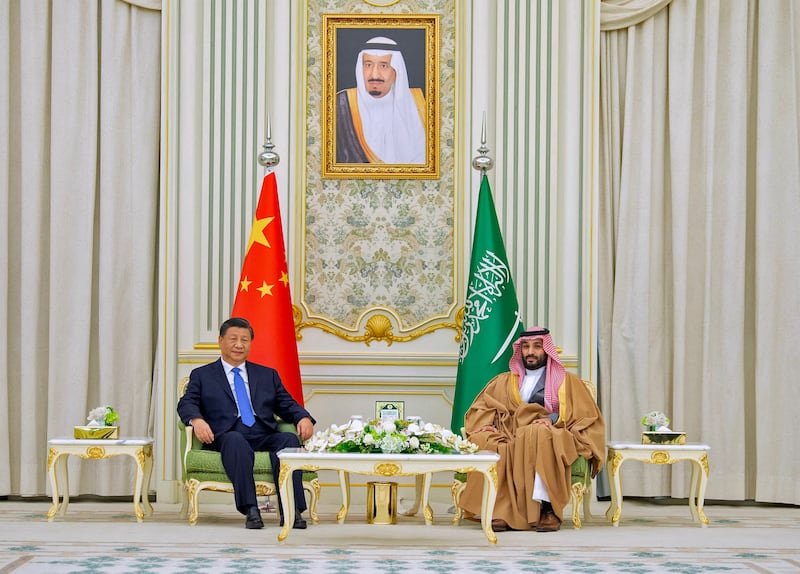 Saudi Crown Prince Mohammed bin Salman welcomes Mr Xi during a ceremony in the capital, Riyadh. AFP