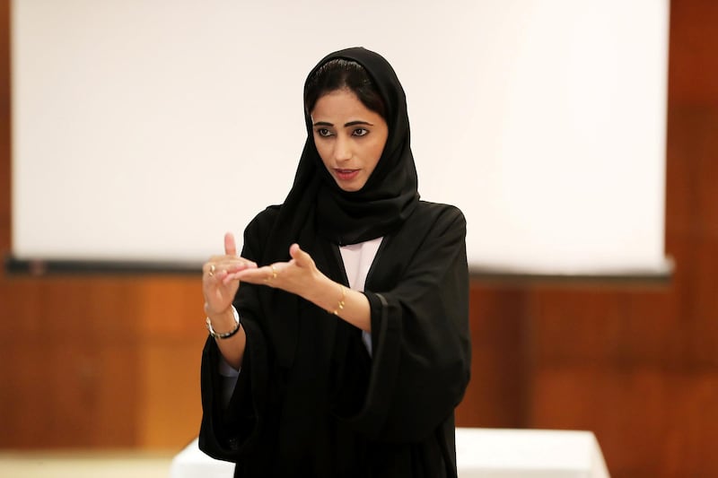 DUBAI , UNITED ARAB EMIRATES , MAY 9 – 2018 :- Abeer Al Shahi , First Emirati to specialise in sign language during the event held at Meydan hotel in Dubai.  ( Pawan Singh / The National )  For News. Story by Ruba Haza