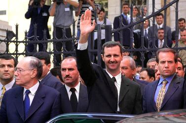 A photo taken on July 17, 2000 shows Syria's President Bashar Al Assad waving to supporters outside the parliament in Damascus after taking the oath to office. AFP