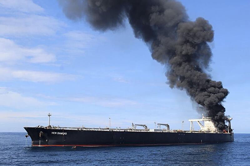 Black smoke rises out from the oil tanker New Diamond, about 60 kilometres off Sri Lanka's eastern coast, after an engine room explosion and fire on September 3, 2020. AFP