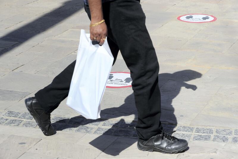 Dubai, United Arab Emirates - Reporter: N/A. News. Coronavirus/Covid-19. A man walks passed a safe distance sign in Bur Dubai. Saturday, October 17th, 2020. Dubai. Chris Whiteoak / The National