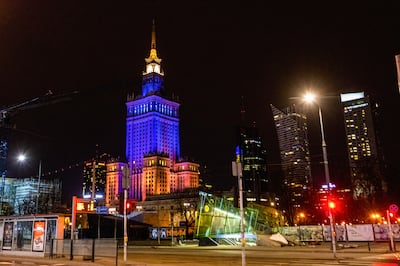 In support of Ukraine, the city of Warsaw lit a skyscraper in Ukrainian flag colours. Getty Images
