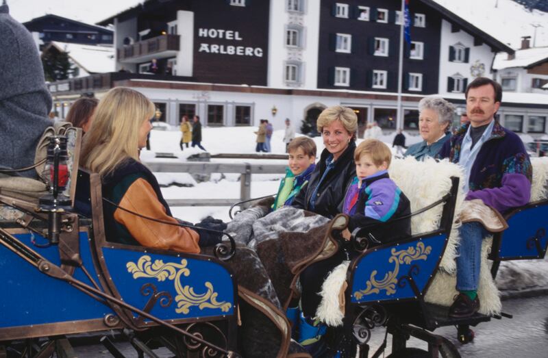 1993: Princess Diana with Prince William and Prince Harry passing the Hotel Arlberg during an afternoon carriage ride, on a ski holiday in Lech, Austria. Getty Images