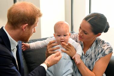 Britain's Prince Harry and his wife Meghan, Duchess of Sussex, holding their son Archie, meet Archbishop Desmond Tutu (not pictured) at the Desmond & Leah Tutu Legacy Foundation in Cape Town, South Africa, September 25, 2019. REUTERS/Toby Melville/Pool