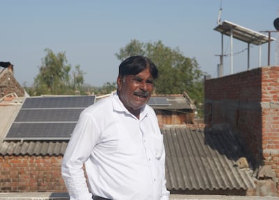 Pathan Sikandar Khan, 60, says that the solar-power installations have reduced power expenses for most households in Modhera. Taniya Dutta/ The National