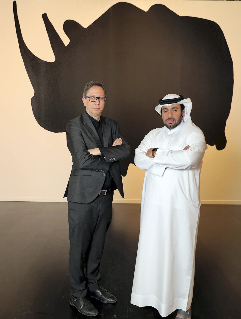 Abu Dhabi, United Arab Emirates - January 30th, 2018: Nasser Abdullah, Chairman of the Emirates Fine Arts Society (R) and Ferran Barenblit, Director of the Barcelona Museum of Contemporary Art (MACBA). The new MACBA/EFAS collaboration Ð art historical exhibition. Tuesday, January 30th, 2018 at Manarat Al Saadiyat, Abu Dhabi. Chris Whiteoak / The National 