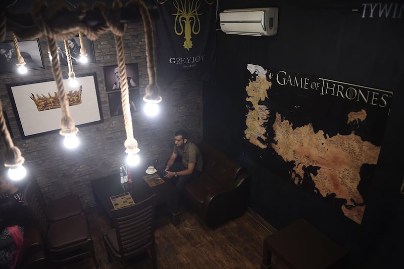 Customer Haseeb Mahmood visits the Game Of Thrones-themed restaurant named King's Landing in Islamabad. Farooq Naeem / AFP