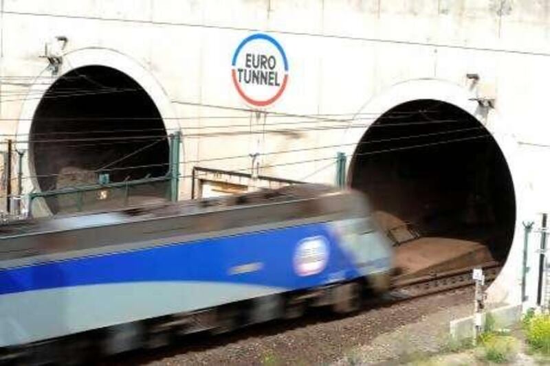 An Eurotunnel shuttle transporting cars to London enters the Channel tunnel after leaving the Eurotunnel terminal in Coquelles, near Calais, northern France, on July 1, 2010. AFP PHOTO / DENIS CHARLET