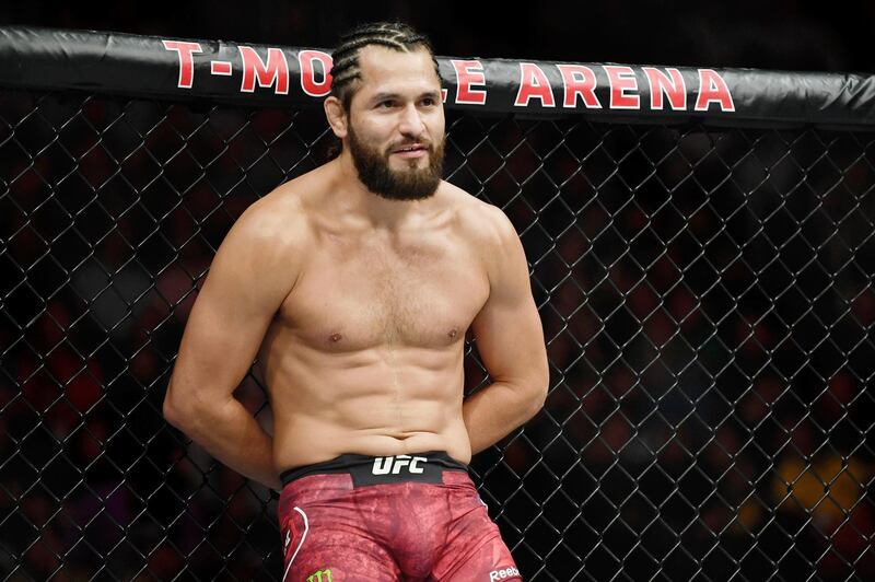 Jul 6, 2019; Las Vegas, NV, USA; Jorge Masvidal (red gloves) stands with his hands behind his back before his fight against Ben Askren (blue gloves) at T-Mobile Arena. Jorge Masvidal set a new record for the fastest knockout in UFC history with five seconds. Mandatory Credit: Stephen R. Sylvanie-USA TODAY Sports