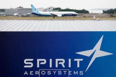 A Boeing 737 Max-10 lands over the Spirit AeroSystems logo during a flying display at the 54th International Paris Air Show at Le Bourget Airport near Paris, France, on June 2023. Reuters. 
