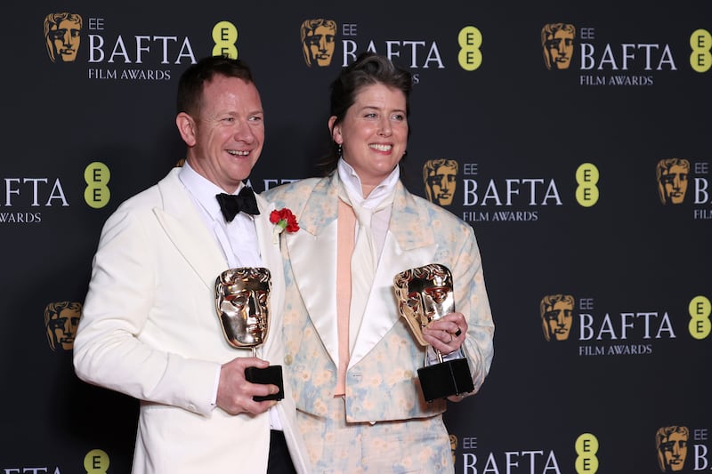 James Price and Shona Heath with the Best Production Design awards for Poor Things. Getty Images