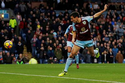 Soccer Football - Premier League - Burnley vs Swansea City - Turf Moor, Burnley, Britain - November 18, 2017   Burnley's Jack Cork scores their first goal    Action Images via Reuters/Craig Brough    EDITORIAL USE ONLY. No use with unauthorized audio, video, data, fixture lists, club/league logos or "live" services. Online in-match use limited to 75 images, no video emulation. No use in betting, games or single club/league/player publications. Please contact your account representative for further details.