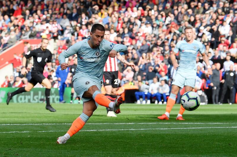 Soccer Football - Premier League - Southampton v Chelsea - St Mary's Stadium, Southampton, Britain - October 7, 2018  Chelsea's Eden Hazard scores their first goal    REUTERS/Toby Melville  EDITORIAL USE ONLY. No use with unauthorized audio, video, data, fixture lists, club/league logos or "live" services. Online in-match use limited to 75 images, no video emulation. No use in betting, games or single club/league/player publications.  Please contact your account representative for further details.