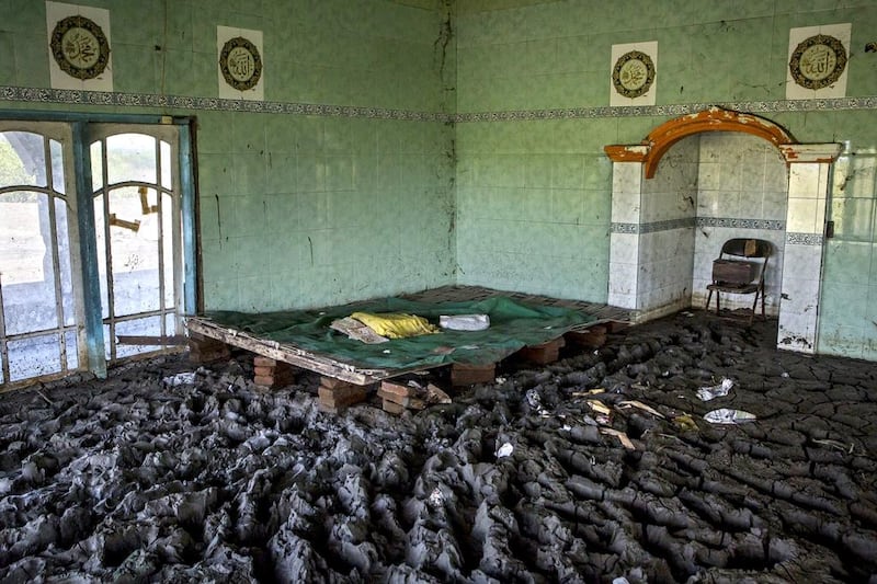 The interior of a mosque destroyed by the 2006 mudflow, blamed on the Indonesian oil and gas company Lapindo Brantas, which refutes the claim. Ulet Ifansasti / Getty Images