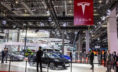 epa09146999 Cars are seen on display at the Tesla trade fair stand during a second media day of the Auto Shanghai 2021 motor show in Shanghai, China, 20 April 2021. The 19th International Automobile Industry Exhibition runs from 24 to 28 April.  EPA/Alex Plavevski
