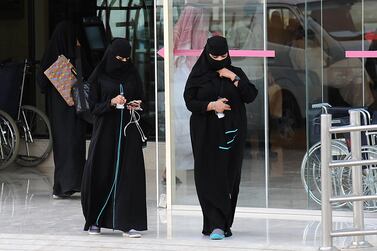 Previous regulations required Saudi women to obtain signed approval from their male guardians. AFP Photo