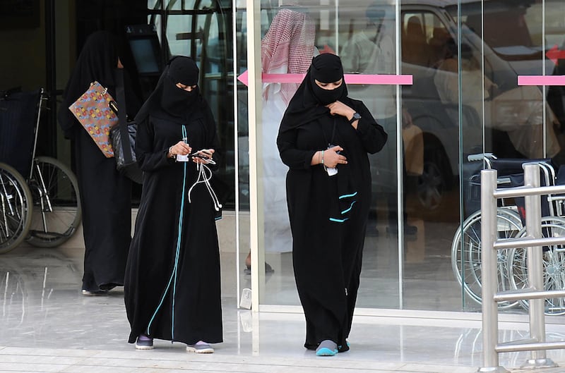 Saudi women leave the emergency department at a hospital in the center of the Saudi capital Riyadh on April 8, 2014. The health ministry reported four more MERS cases in Jeddah, two of them among health workers, prompting authorities to close the emergency department at the city's King Fahd Hospital.      AFP PHOTO/FAYEZ NURELDINE (Photo by FAYEZ NURELDINE / AFP)