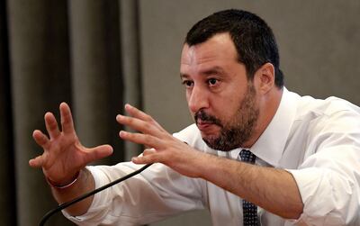 Italy’s Interior Minister and Deputy Prime Minister Matteo Salvini gestures during a press conference in Rome, on June 25, 2018. Salvini said the Lifeline rescue ship which belongs to German NGO Lifeline and which is currently stranded in Maltese waters with more than 200 migrants on board will not be allowed to dock in Italy. / AFP / TIZIANA FABI
