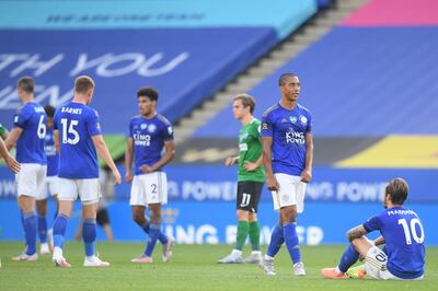 Players react at the final whistle during the English Premier League football match between Leicester City and Brighton and Hove Albion at the King Power Stadium in Leicester, central England on June 23, 2020. RESTRICTED TO EDITORIAL USE. No use with unauthorized audio, video, data, fixture lists, club/league logos or 'live' services. Online in-match use limited to 120 images. An additional 40 images may be used in extra time. No video emulation. Social media in-match use limited to 120 images. An additional 40 images may be used in extra time. No use in betting publications, games or single club/league/player publications.
 / AFP / POOL / Michael Regan / RESTRICTED TO EDITORIAL USE. No use with unauthorized audio, video, data, fixture lists, club/league logos or 'live' services. Online in-match use limited to 120 images. An additional 40 images may be used in extra time. No video emulation. Social media in-match use limited to 120 images. An additional 40 images may be used in extra time. No use in betting publications, games or single club/league/player publications.
