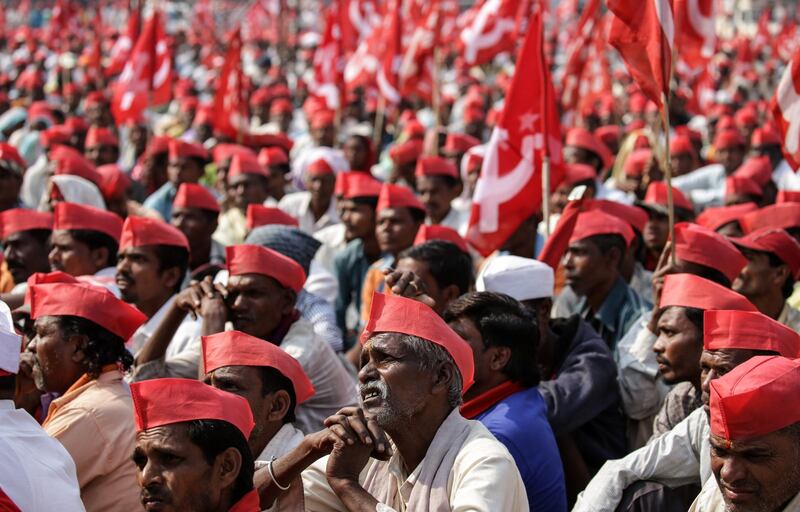 Farmers from Nasik listens to their leader during a protest rally in Mumbai, India. According to media reports, around 30,000 farmers began a protest march from Nasik to Mumbai, to protest outside the Maharashtra Assembly. Divyakant Solanki / EPA