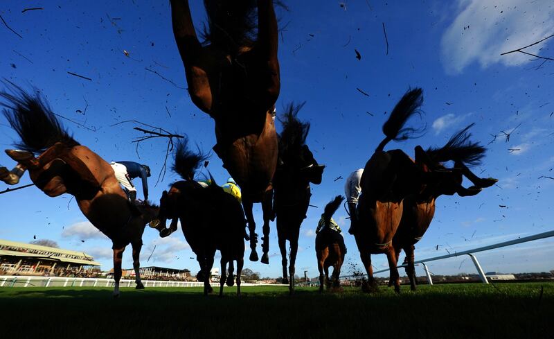 Runners and riders in action on Tuesday afternoon in the Handicap Chase at Hereford Racecourse. PA