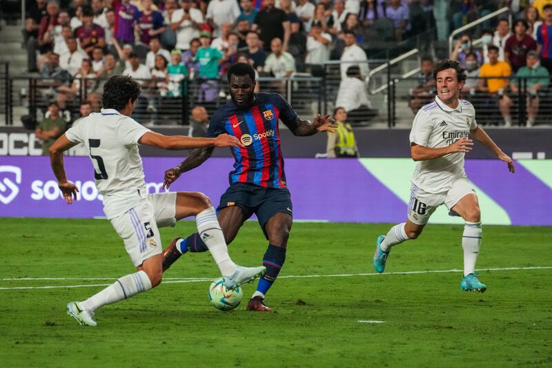 Barcelona midfielder Franck Kessie takes the shot against Real Madrid. EPA