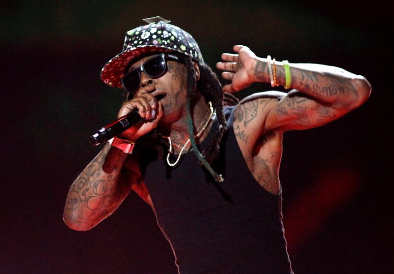 FILE PHOTO - Rapper Lil Wayne performs during the 2015 iHeartRadio Music Festival at the MGM Grand Garden Arena in Las Vegas, Nevada September 18, 2015. REUTERS/Steve Marcus/File Photo