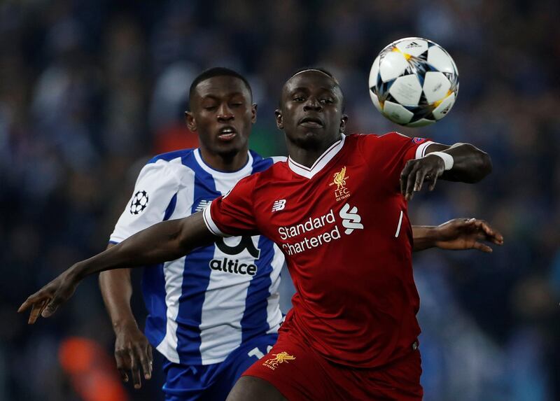 Soccer Football - Champions League Round of 16 Second Leg - Liverpool vs FC Porto - Anfield, Liverpool, Britain - March 6, 2018   Liverpool's Sadio Mane in action with Porto's Waris Majeed                   Action Images via Reuters/Lee Smith